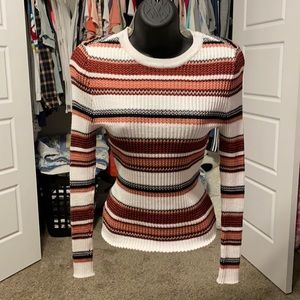 It’s our time shirt cream, black & orange stripe